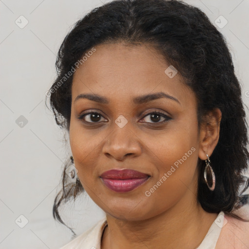 Joyful black young-adult female with medium  brown hair and brown eyes