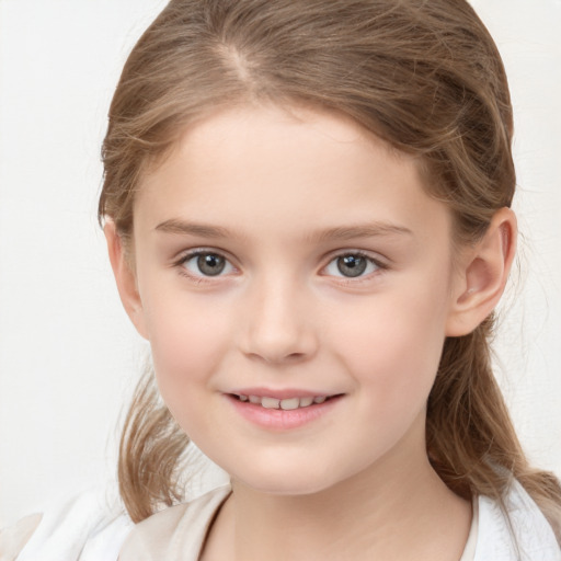 Joyful white child female with medium  brown hair and brown eyes