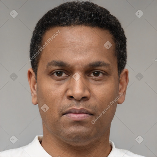 Neutral latino young-adult male with short  brown hair and brown eyes