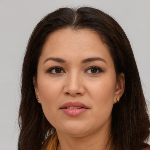 Joyful white young-adult female with long  brown hair and brown eyes