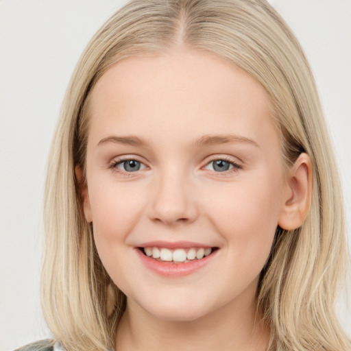 Joyful white young-adult female with long  brown hair and blue eyes