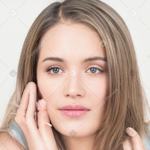 Neutral white young-adult female with long  brown hair and brown eyes