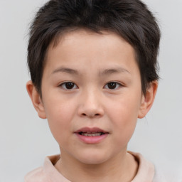 Joyful white child male with short  brown hair and brown eyes