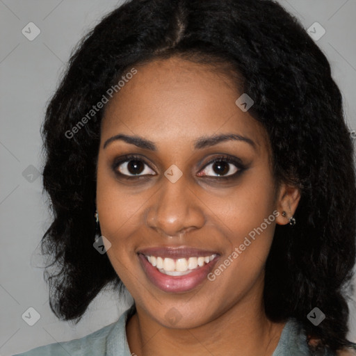 Joyful latino young-adult female with long  black hair and brown eyes