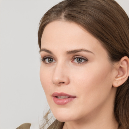 Neutral white young-adult female with medium  brown hair and brown eyes