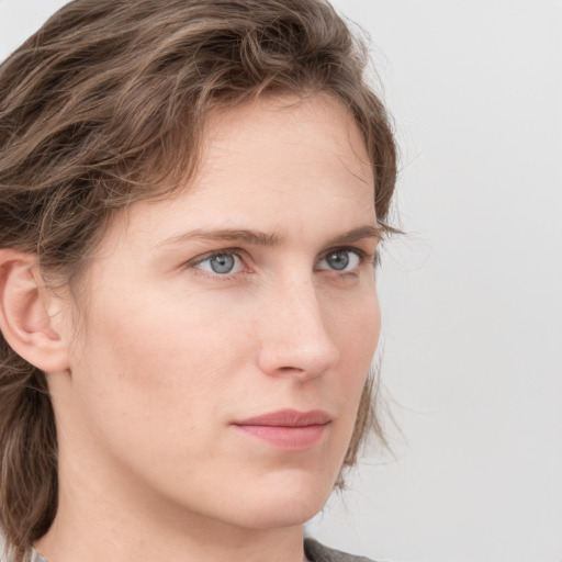 Neutral white young-adult female with medium  brown hair and grey eyes