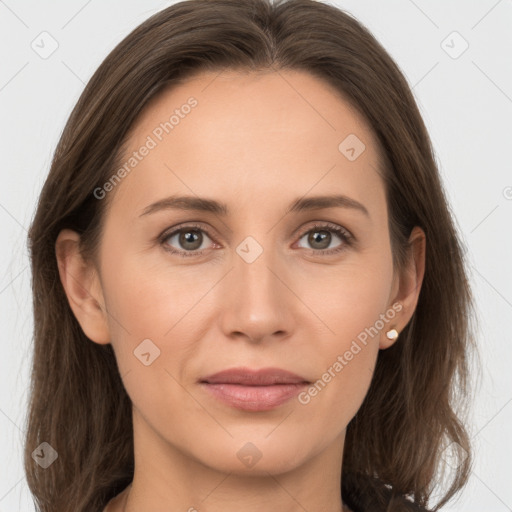 Joyful white young-adult female with long  brown hair and grey eyes