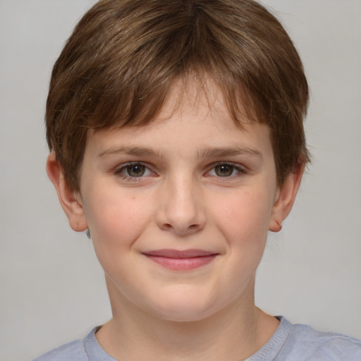 Joyful white child female with short  brown hair and grey eyes