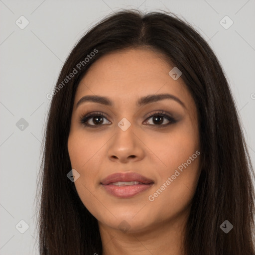 Joyful latino young-adult female with long  brown hair and brown eyes