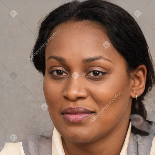 Joyful black adult female with medium  brown hair and brown eyes