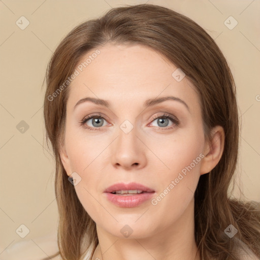 Joyful white young-adult female with long  brown hair and green eyes