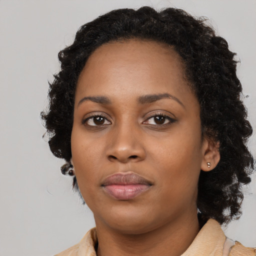 Neutral black young-adult female with medium  black hair and brown eyes
