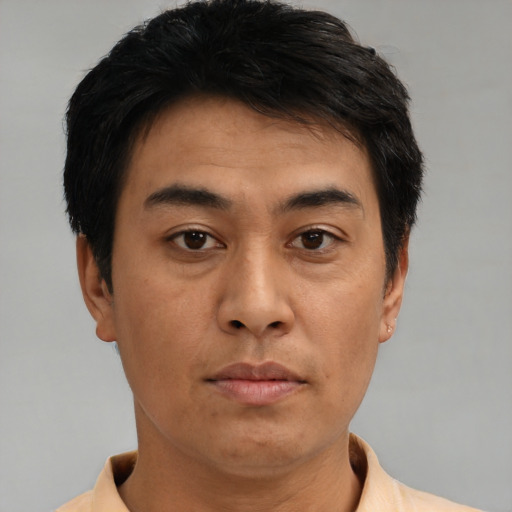 Neutral asian young-adult male with short  brown hair and brown eyes