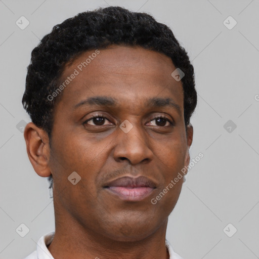 Neutral black young-adult male with short  brown hair and brown eyes