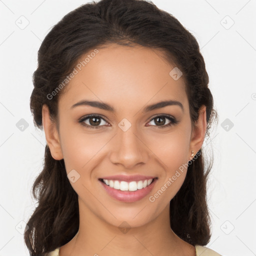 Joyful latino young-adult female with long  brown hair and brown eyes