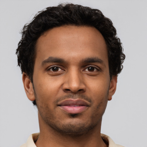 Neutral black young-adult male with short  brown hair and brown eyes