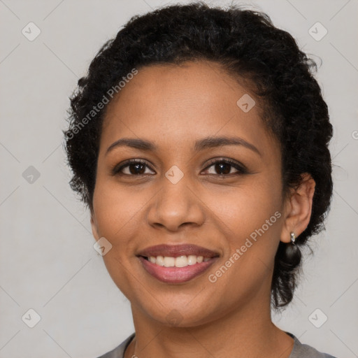 Joyful latino young-adult female with short  brown hair and brown eyes