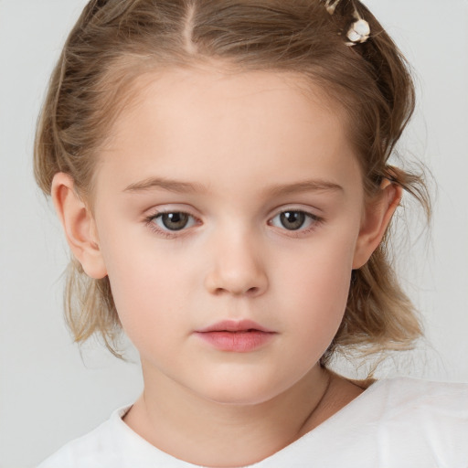 Neutral white child female with medium  brown hair and brown eyes