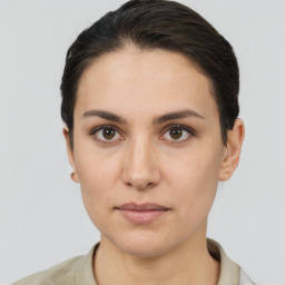 Neutral white young-adult female with short  brown hair and brown eyes