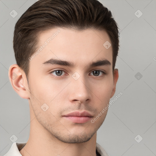 Neutral white young-adult male with short  brown hair and brown eyes