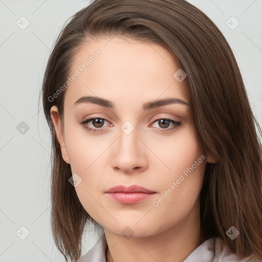 Neutral white young-adult female with long  brown hair and brown eyes