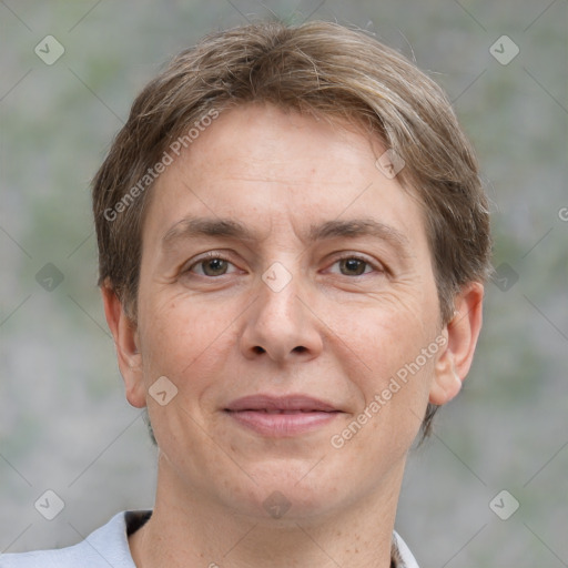 Joyful white adult male with short  brown hair and grey eyes