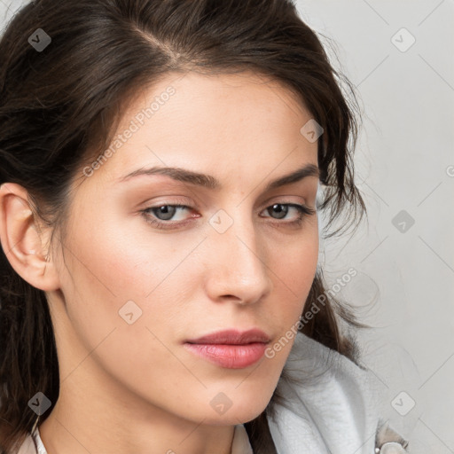 Neutral white young-adult female with medium  brown hair and grey eyes