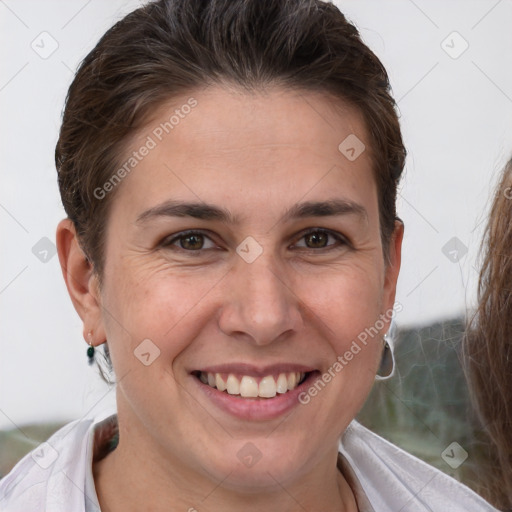 Joyful white young-adult female with short  brown hair and brown eyes