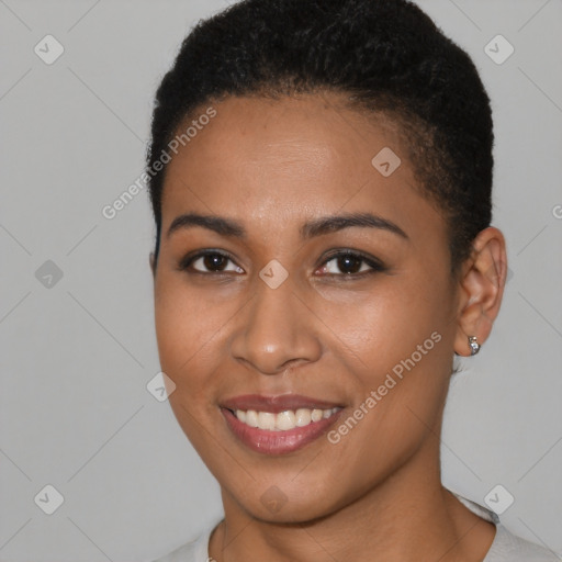 Joyful latino young-adult female with short  brown hair and brown eyes