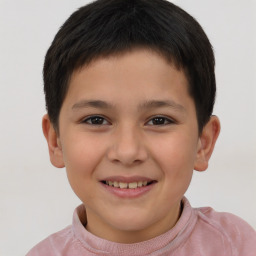 Joyful white child female with short  brown hair and brown eyes