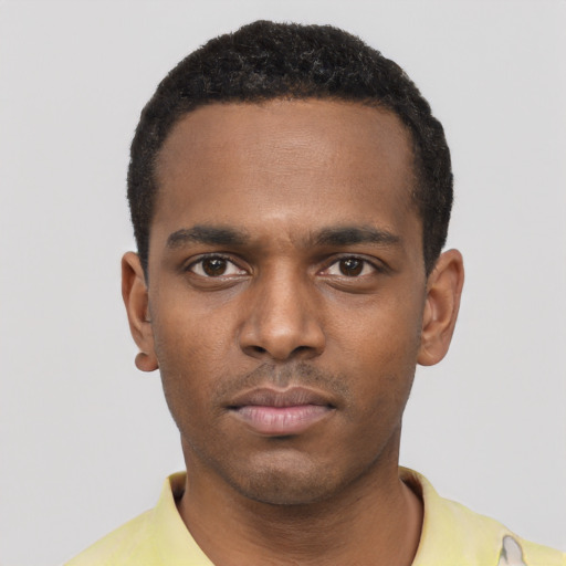Neutral black young-adult male with short  black hair and brown eyes