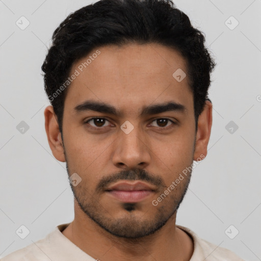 Neutral latino young-adult male with short  black hair and brown eyes