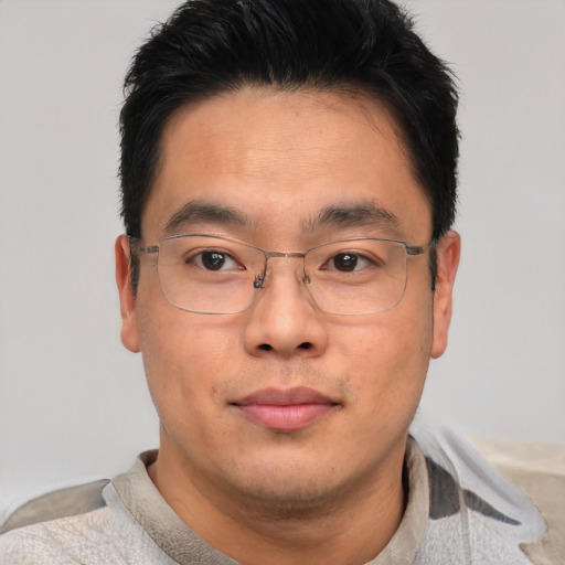 Neutral asian young-adult male with short  brown hair and brown eyes