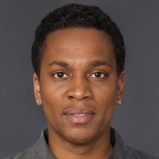 Neutral black young-adult male with short  brown hair and brown eyes
