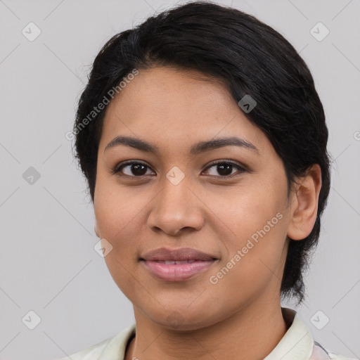 Joyful asian young-adult female with medium  black hair and brown eyes