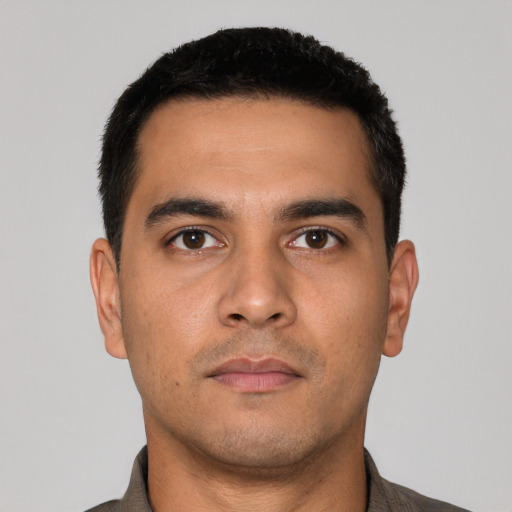 Neutral white young-adult male with short  black hair and brown eyes