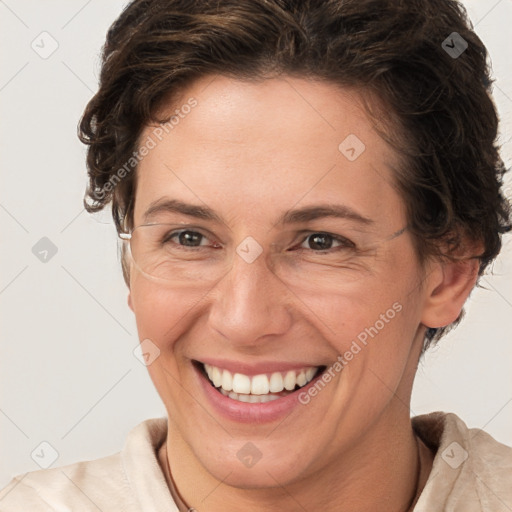 Joyful white adult female with short  brown hair and brown eyes