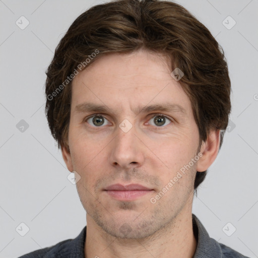 Neutral white adult male with short  brown hair and grey eyes