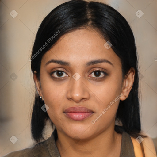 Joyful latino young-adult female with long  black hair and brown eyes