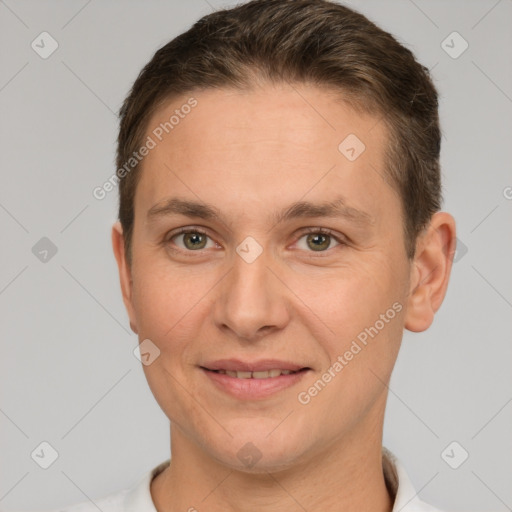 Joyful white young-adult male with short  brown hair and brown eyes