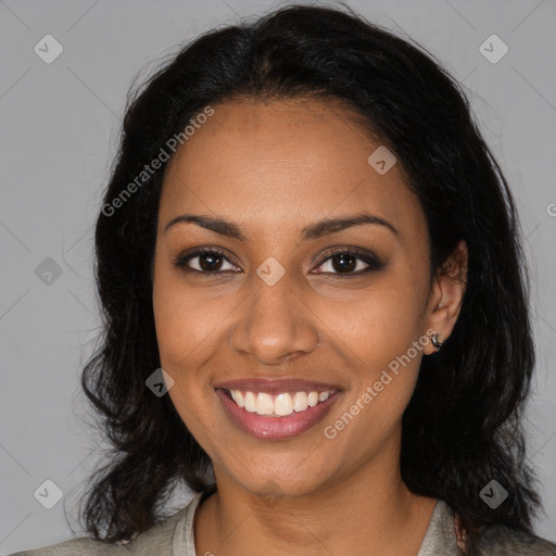 Joyful black young-adult female with medium  black hair and brown eyes