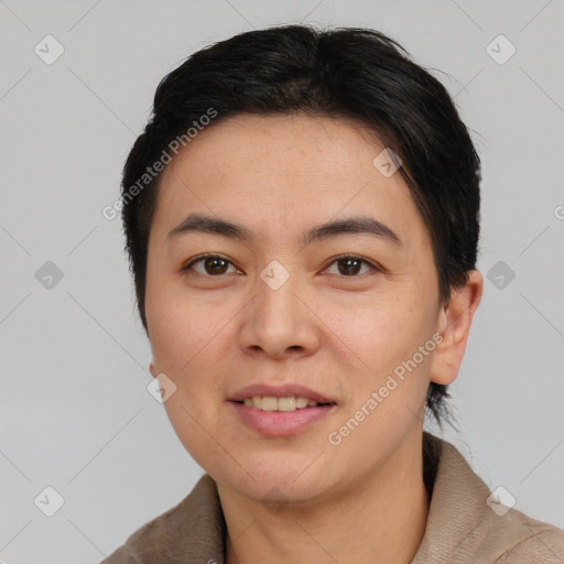 Joyful asian young-adult female with short  brown hair and brown eyes