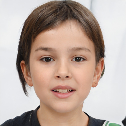 Joyful white child female with short  brown hair and brown eyes