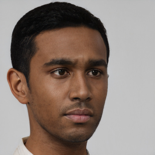 Neutral black young-adult male with short  black hair and brown eyes