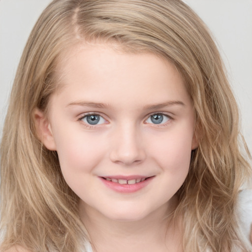 Joyful white child female with medium  brown hair and grey eyes