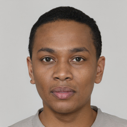Neutral black young-adult male with short  black hair and brown eyes