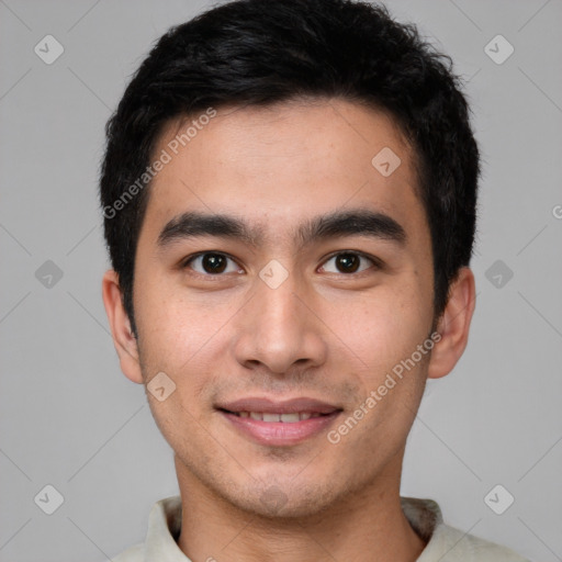 Joyful white young-adult male with short  black hair and brown eyes