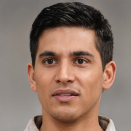 Neutral latino young-adult male with short  black hair and brown eyes