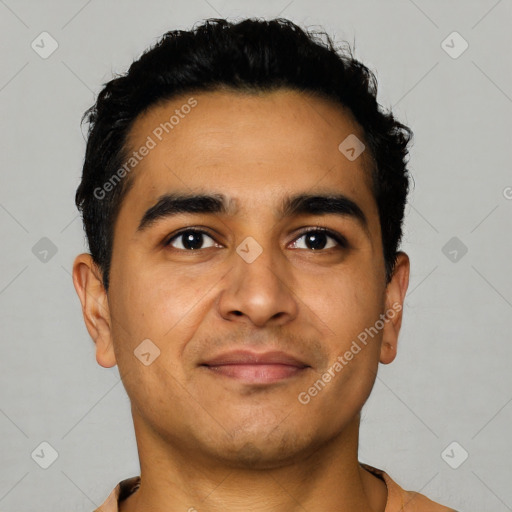 Joyful latino young-adult male with short  black hair and brown eyes