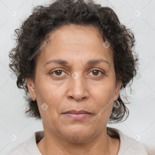 Joyful white adult female with short  brown hair and brown eyes